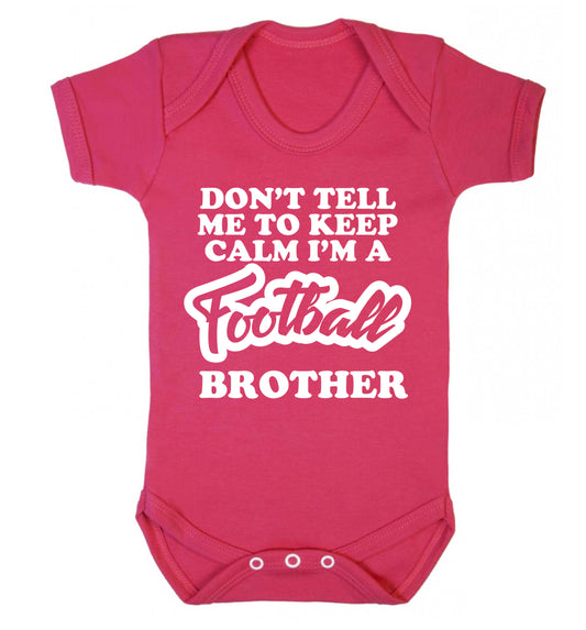 Don't tell me to keep calm I'm a football brother Baby Vest dark pink 18-24 months