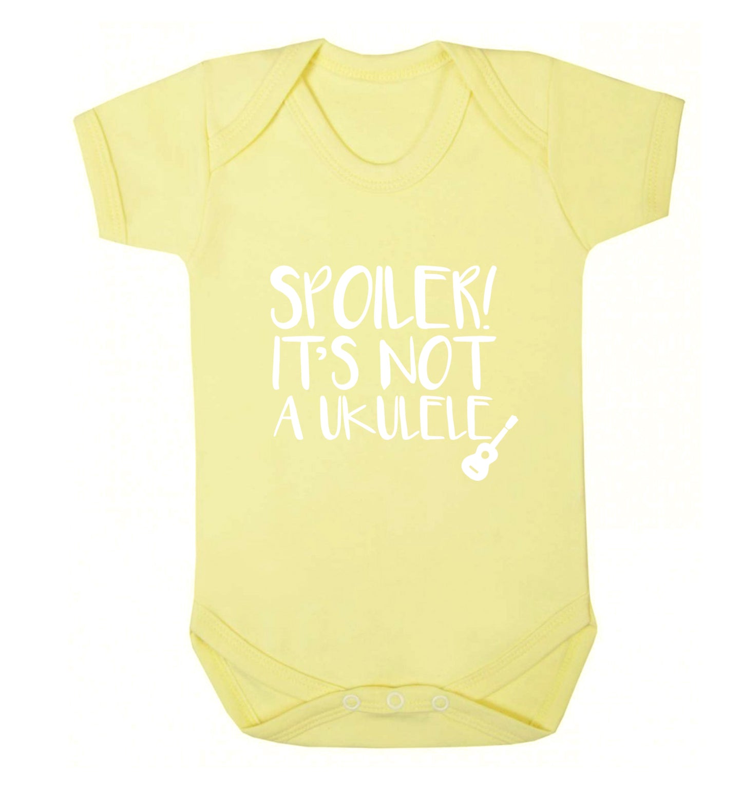 Spoiler it's not a ukulele Baby Vest pale yellow 18-24 months