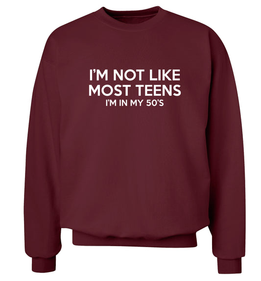 I'm not like most teens (I'm in my 50's) Adult's unisex maroon Sweater 2XL