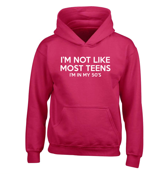 I'm not like most teens (I'm in my 50's) children's pink hoodie 12-13 Years