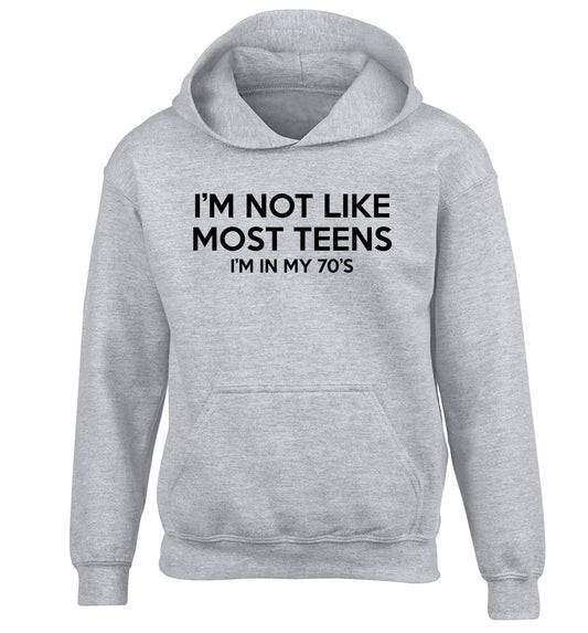I'm not like most teens (I'm in my 70's) children's grey hoodie 12-13 Years