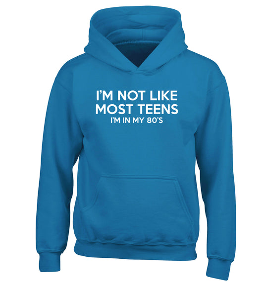 I'm not like most teens (I'm in my 80's) children's blue hoodie 12-13 Years