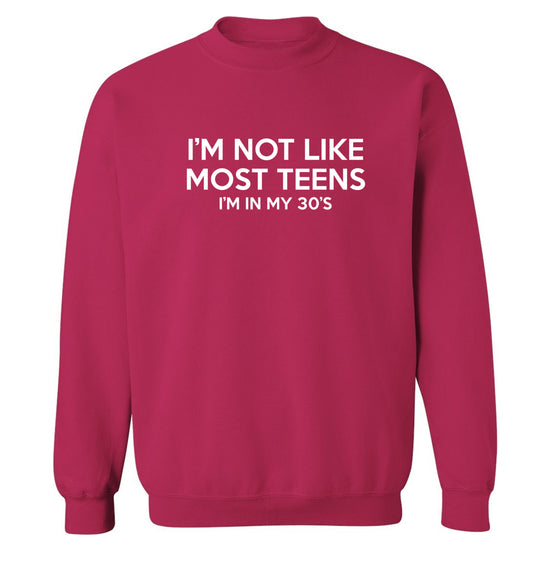 I'm not like most teens (I'm in my 30's) Adult's unisex pink Sweater 2XL