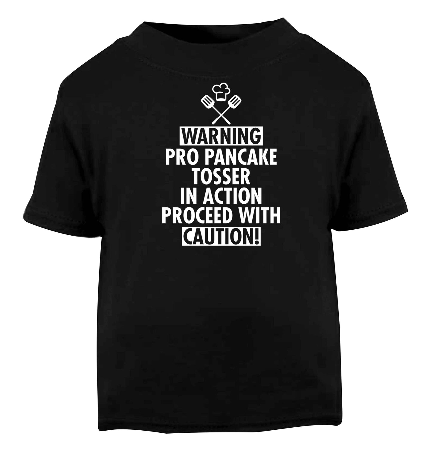 Warning pro pancake tosser in action proceed with caution Black baby toddler Tshirt 2 years