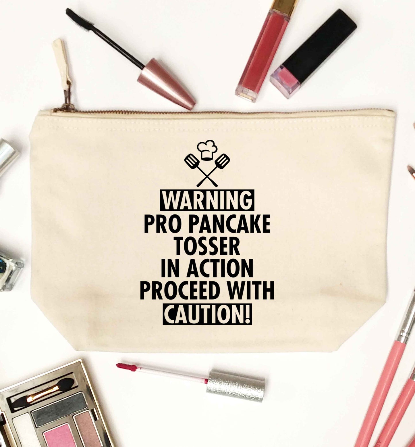 Warning pro pancake tosser in action proceed with caution natural makeup bag