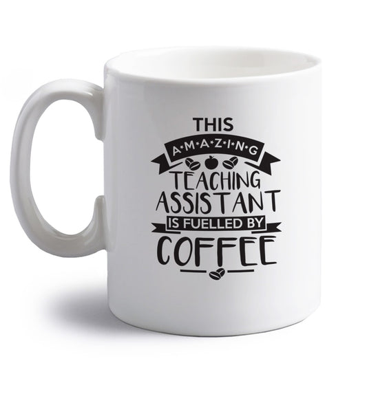 This amazing teaching assistant is fuelled by coffee right handed white ceramic mug 