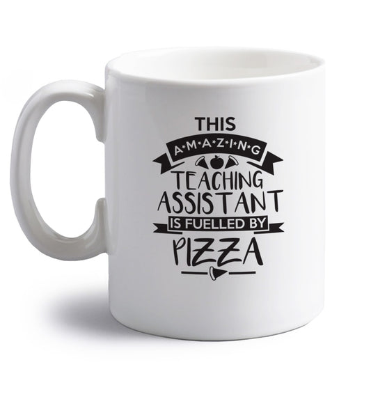 This amazing teaching assistant is fuelled by pizza right handed white ceramic mug 