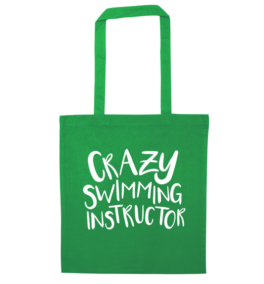 Crazy swimming instructor green tote bag