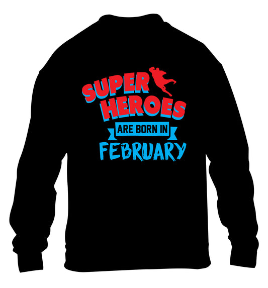 superheroes are born in February children's black sweater 12-13 Years