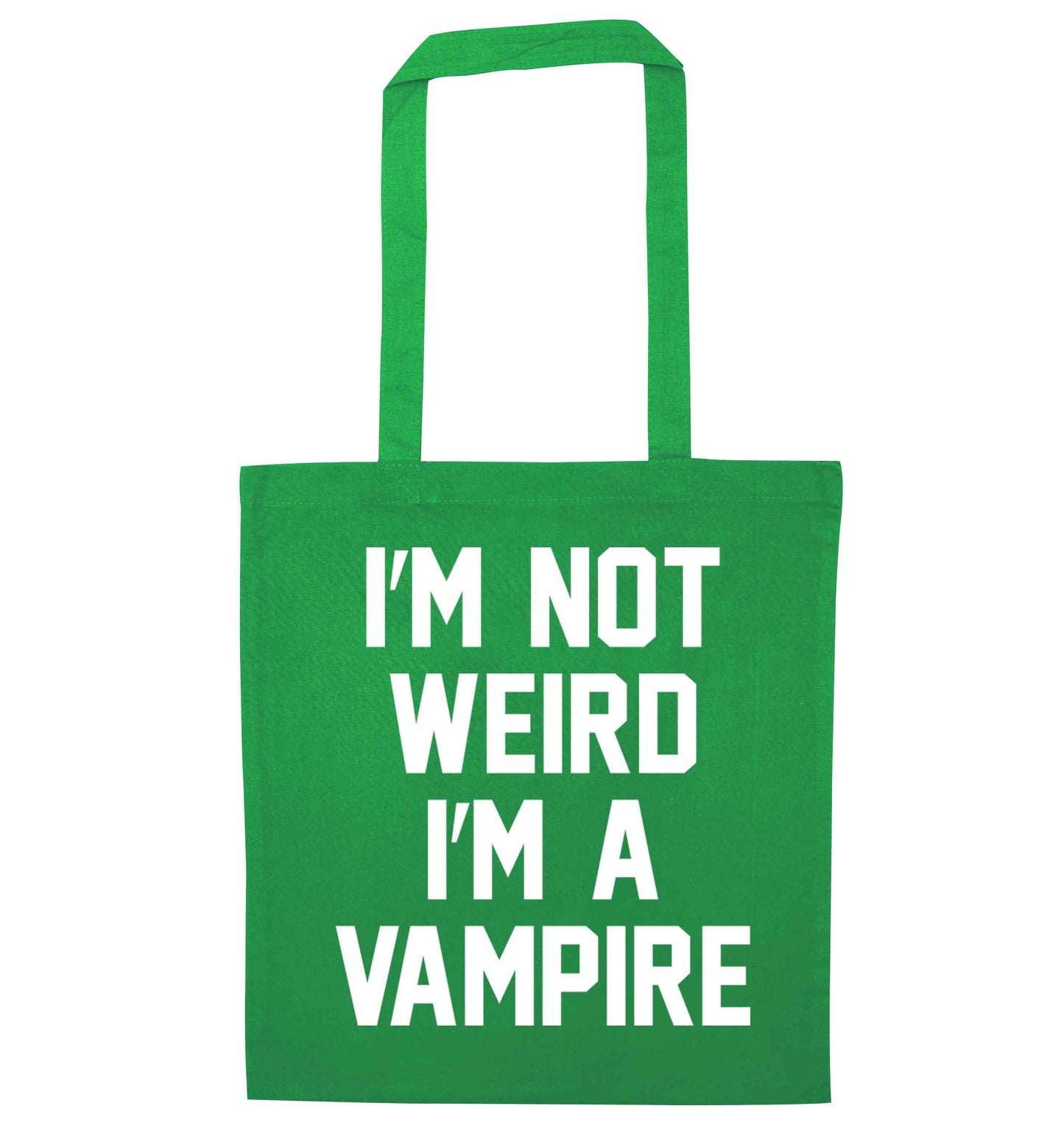 I'm not weird I'm a vampire green tote bag