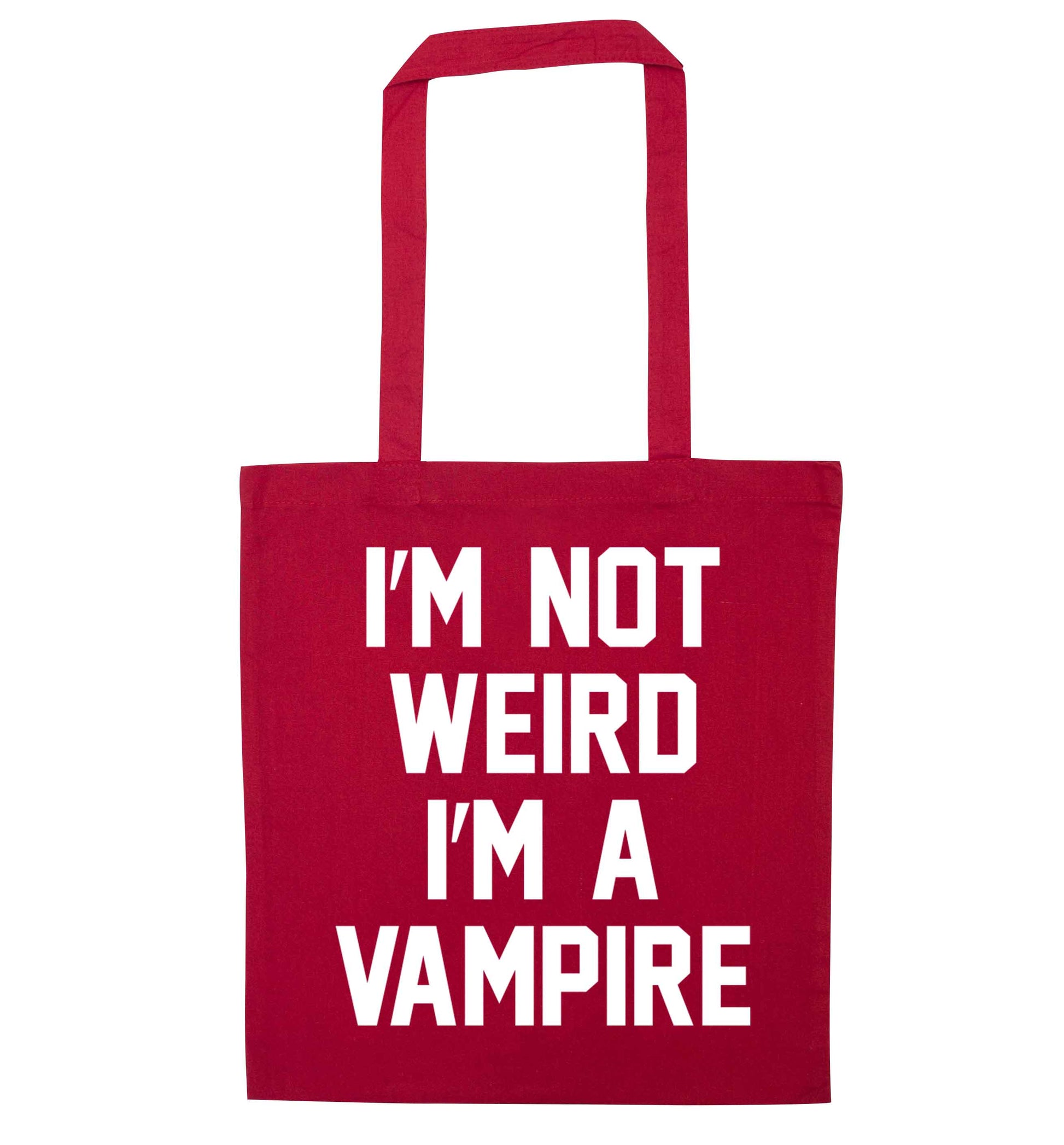 I'm not weird I'm a vampire red tote bag