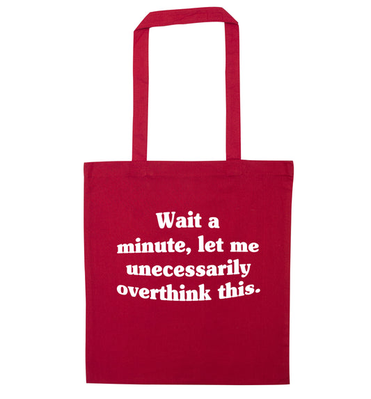 Wait a minute, let me unecessarily overthink this. red tote bag