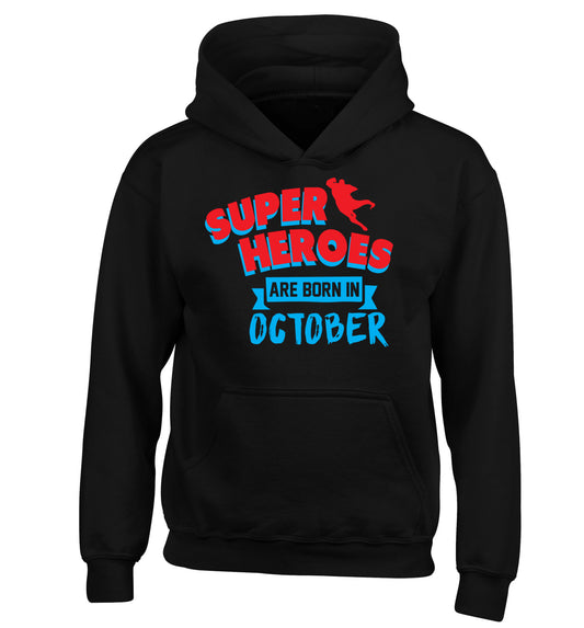 Superheroes are born in October children's black hoodie 12-13 Years