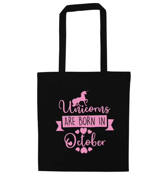 Unicorns are born in October black tote bag