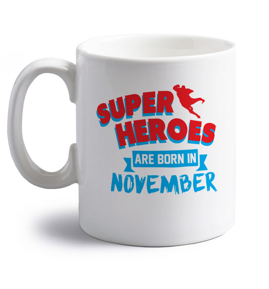 Superheroes are born in November right handed white ceramic mug 
