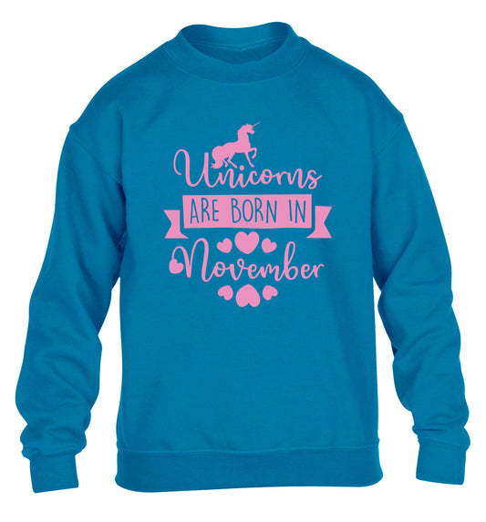 Unicorns are born in November children's blue sweater 12-13 Years