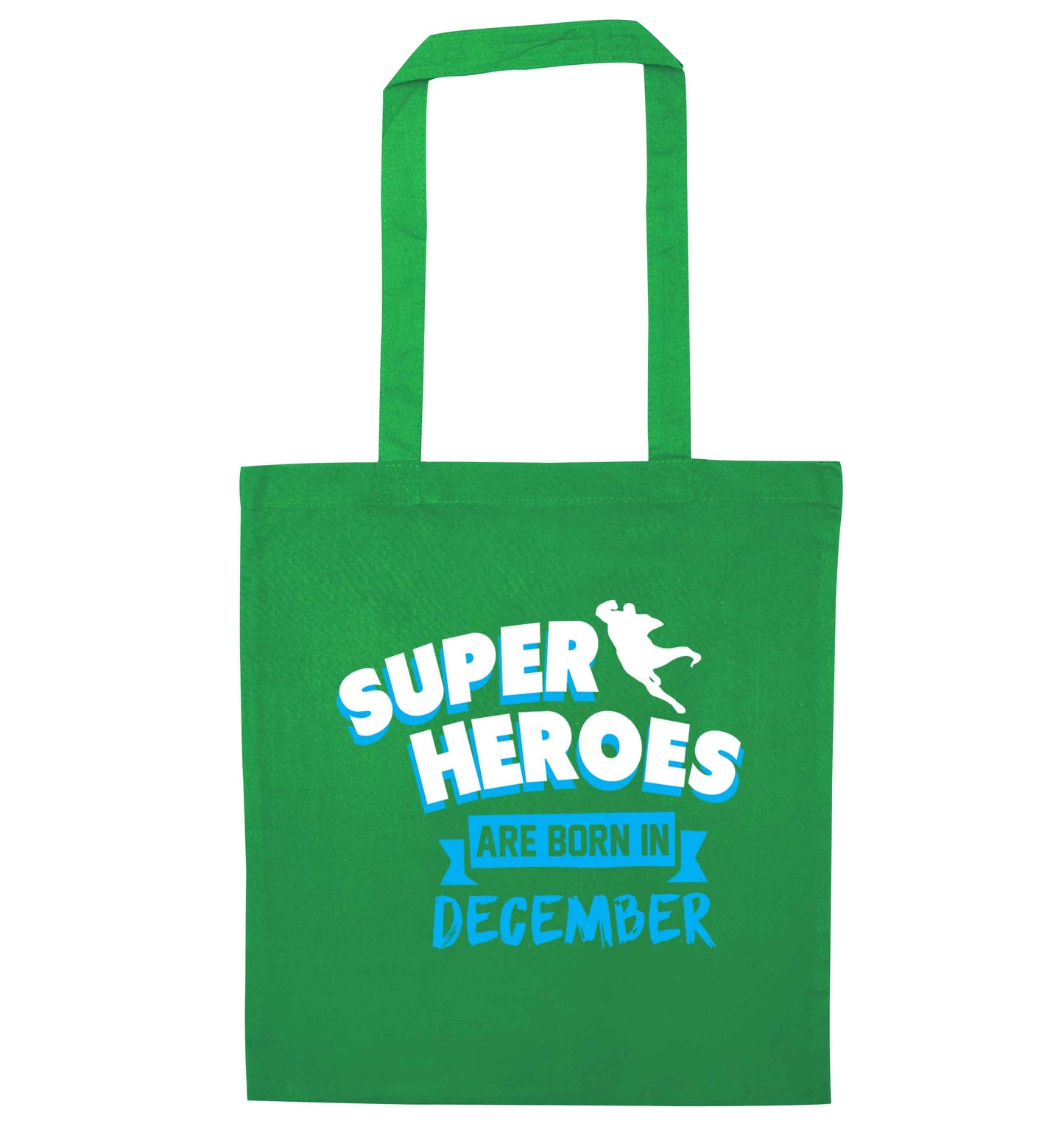 Superheroes are born in December green tote bag