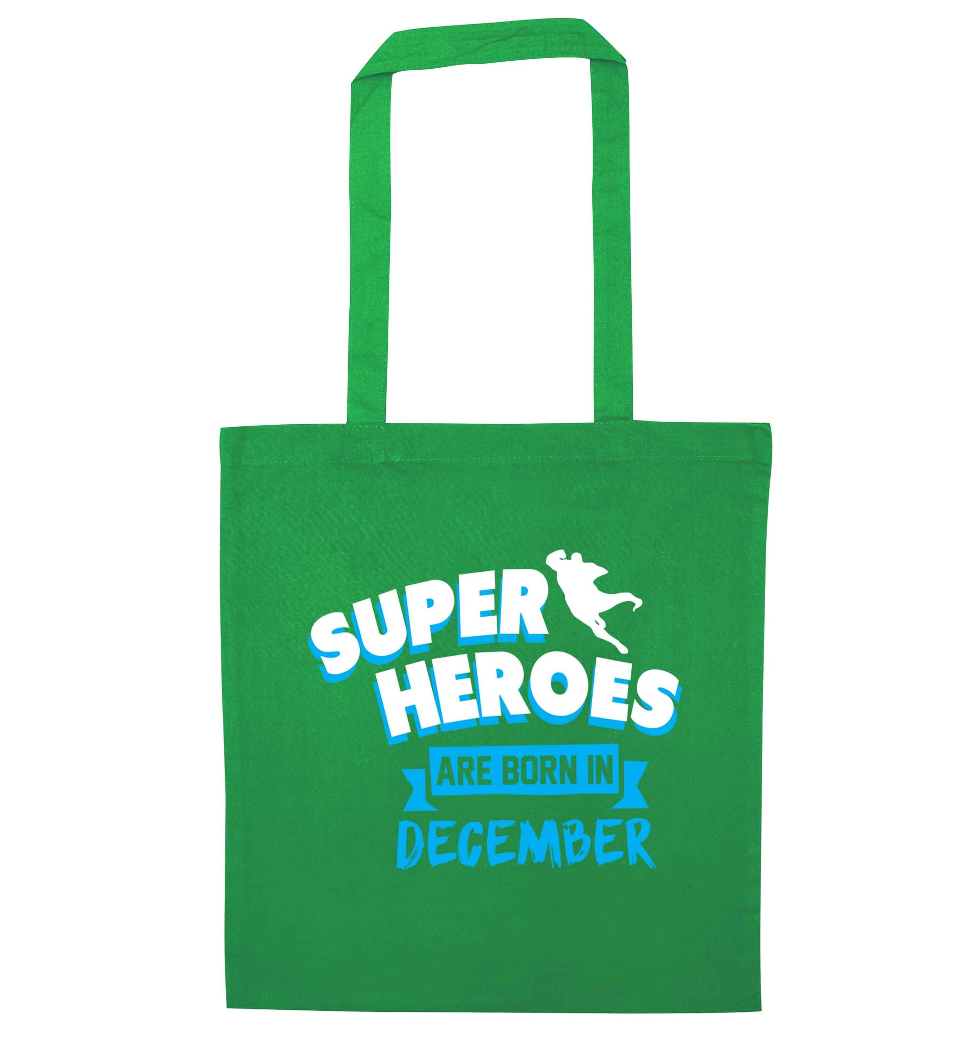 Superheroes are born in December green tote bag