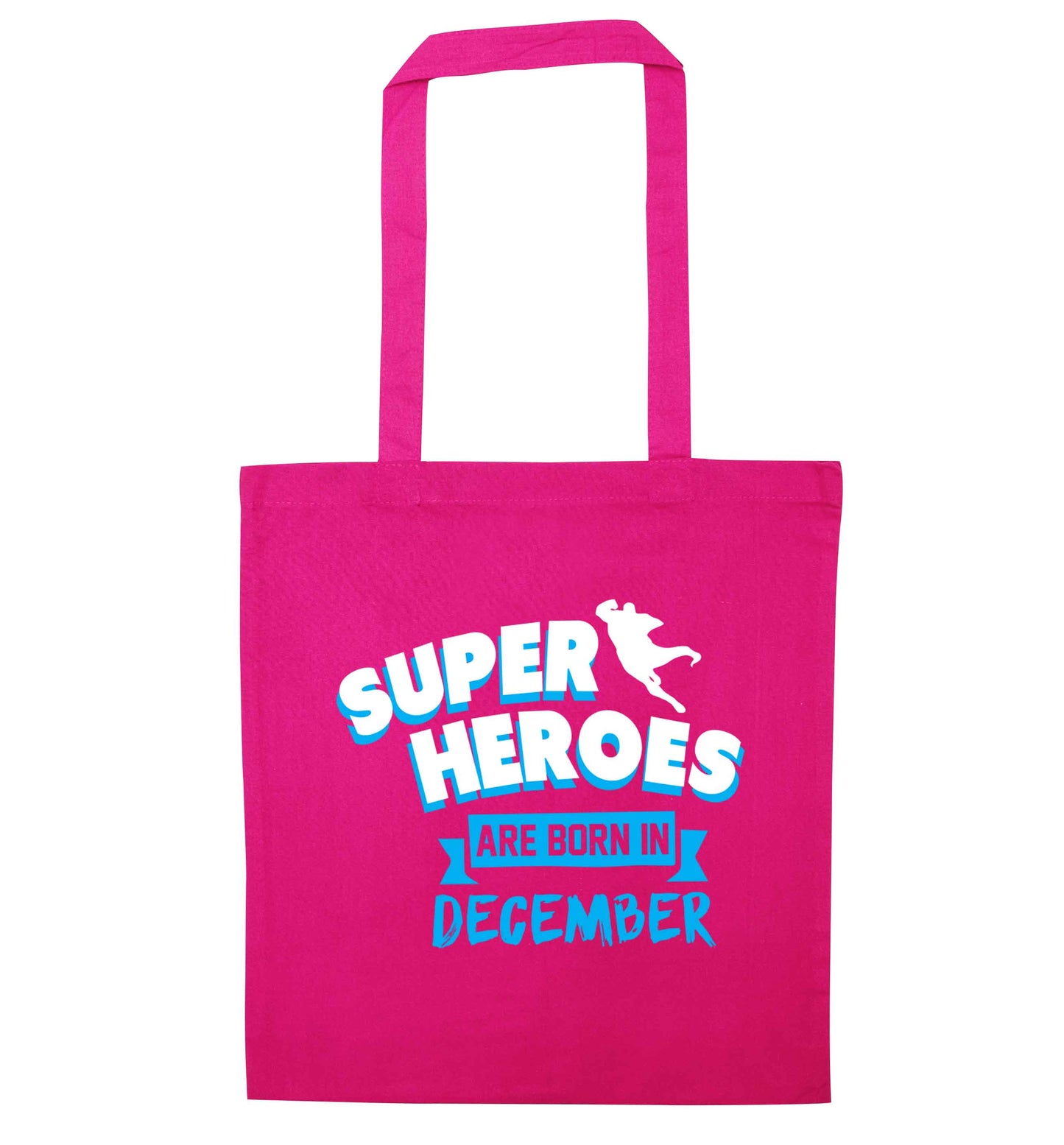 Superheroes are born in December pink tote bag