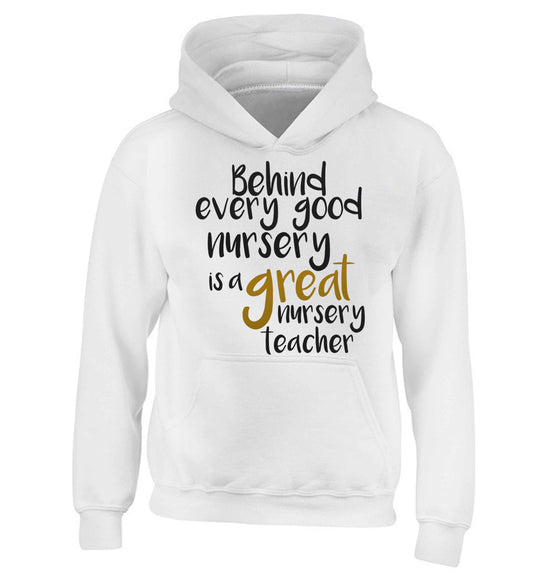 Behind every good nursery is a great nursery teacher children's white hoodie 12-13 Years