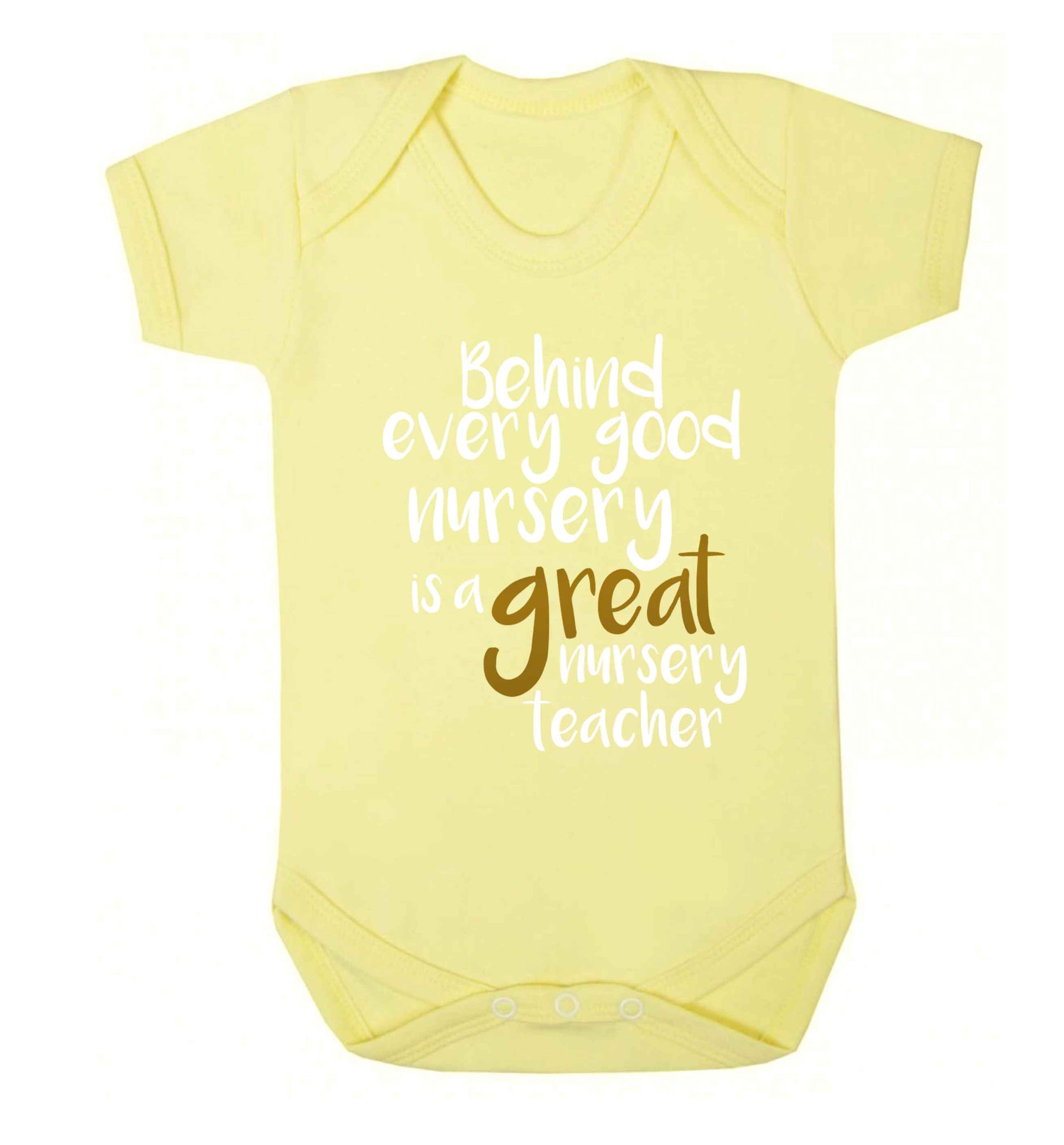 Behind every good nursery is a great nursery teacher Baby Vest pale yellow 18-24 months