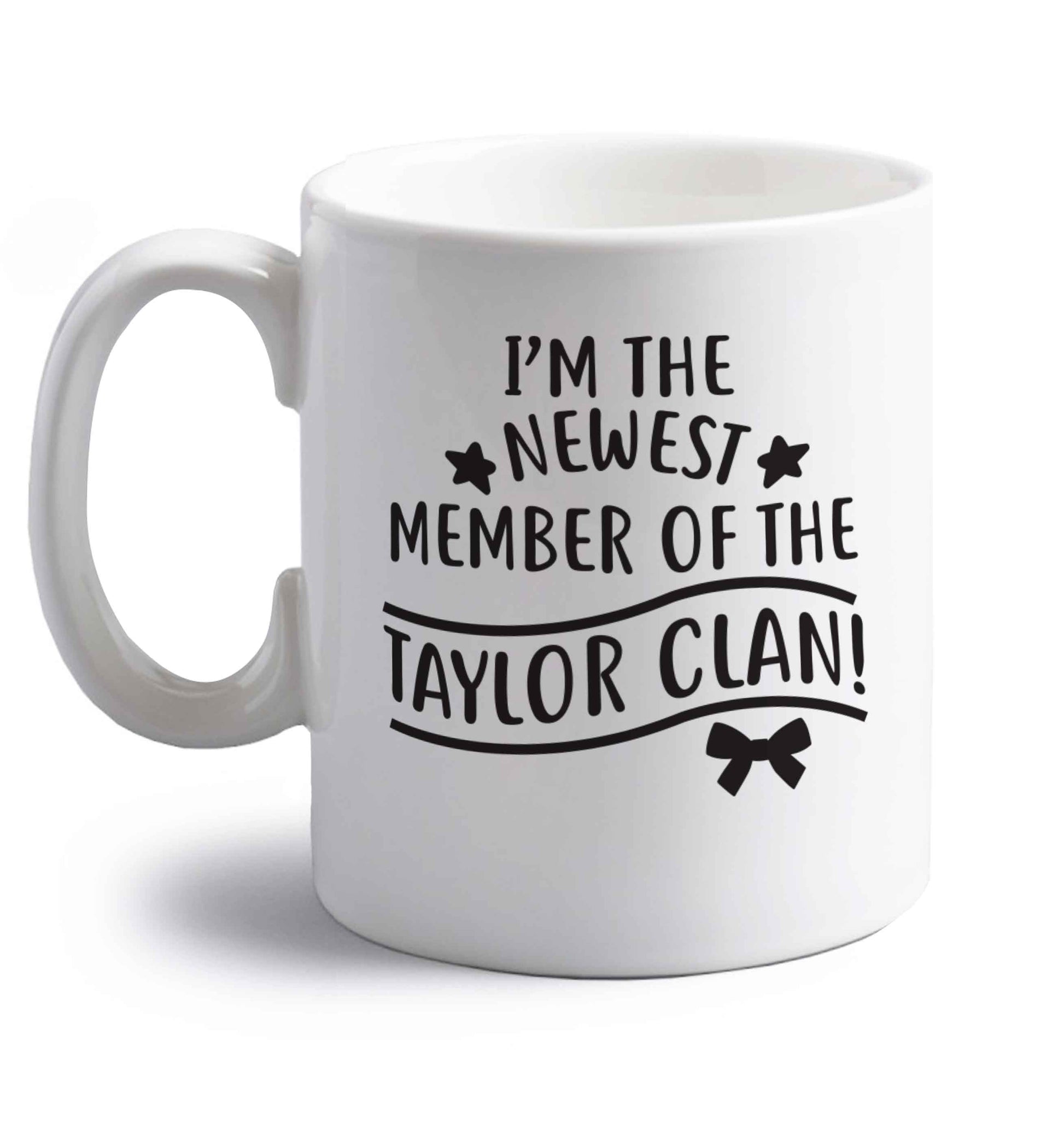 Personalised, newest member of the Taylor clan right handed white ceramic mug 