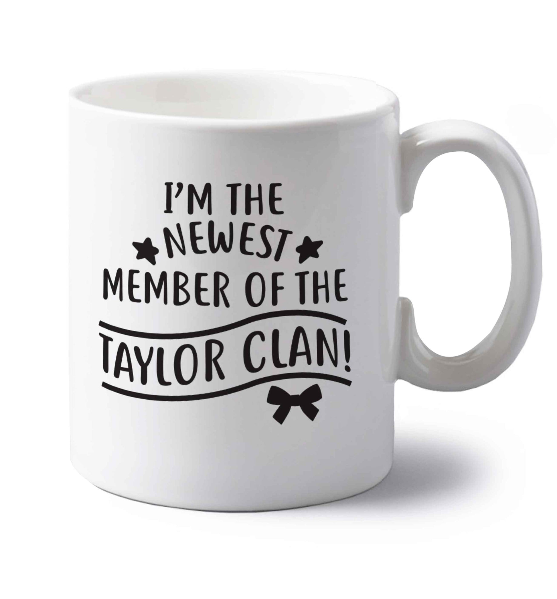 Personalised, newest member of the Taylor clan left handed white ceramic mug 