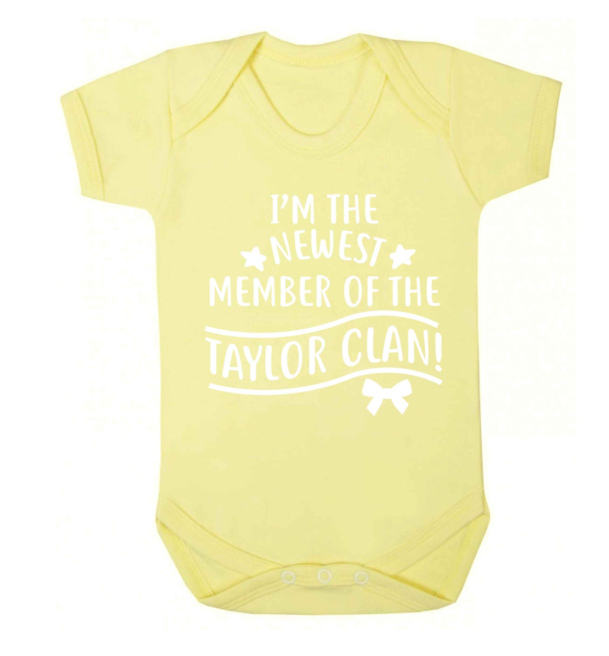 Personalised, newest member of the Taylor clan Baby Vest pale yellow 18-24 months