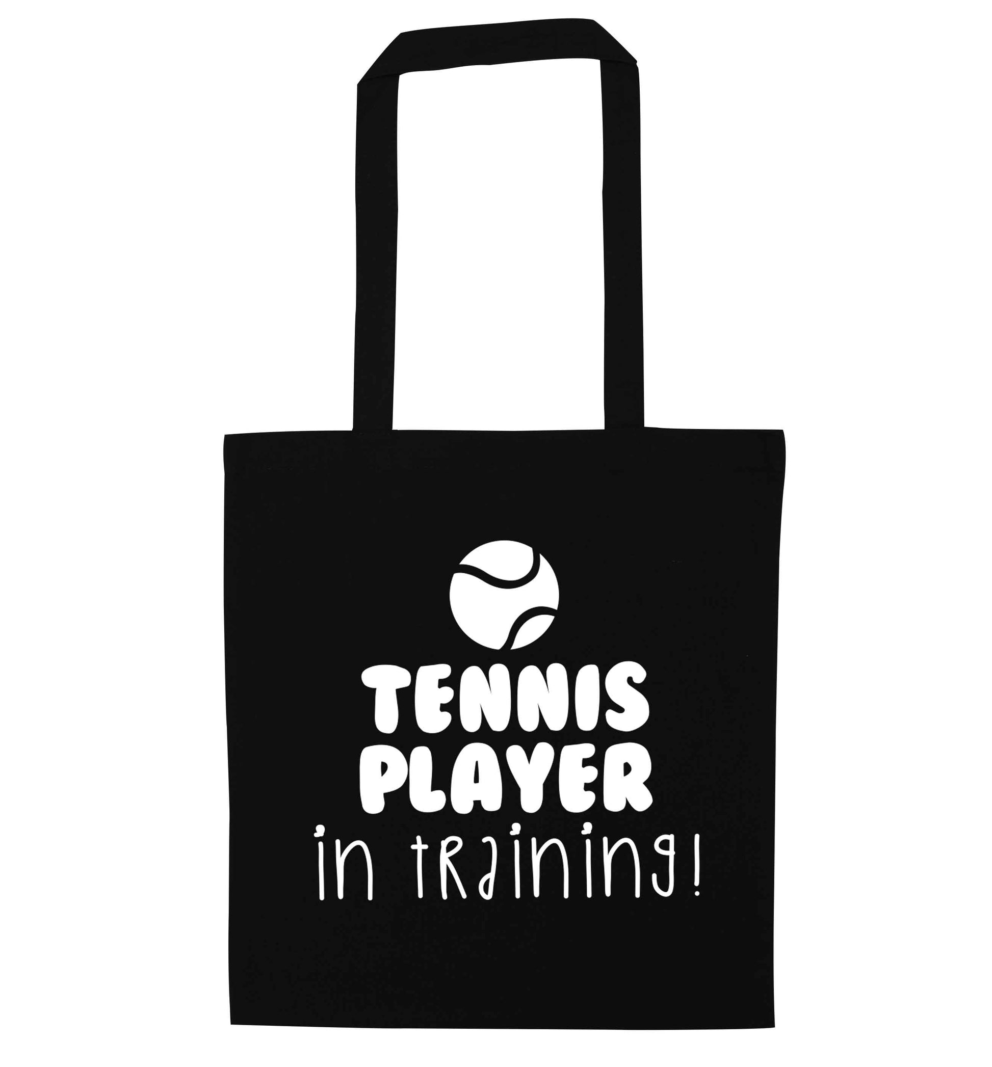 Tennis player in training black tote bag