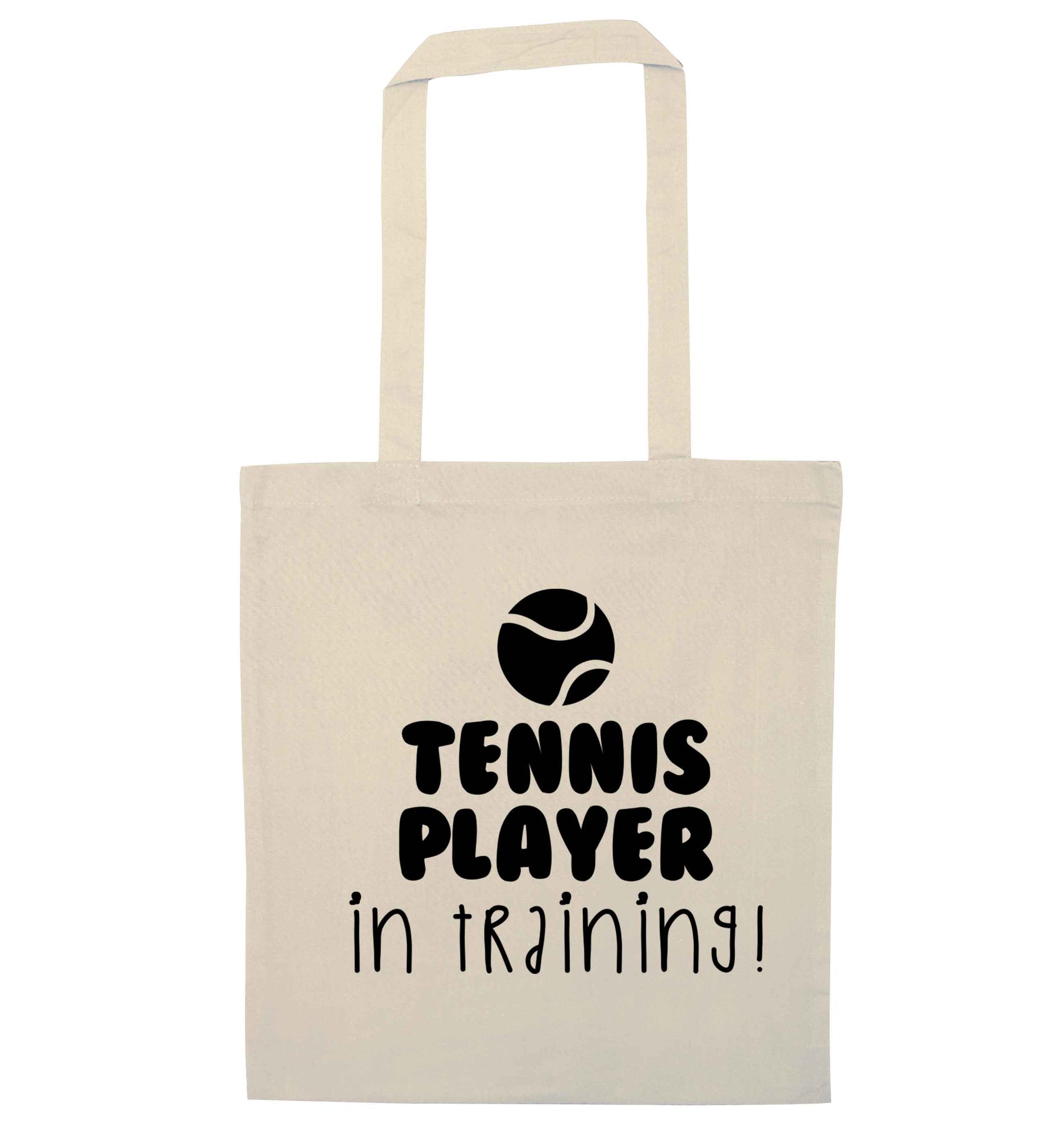 Tennis player in training natural tote bag