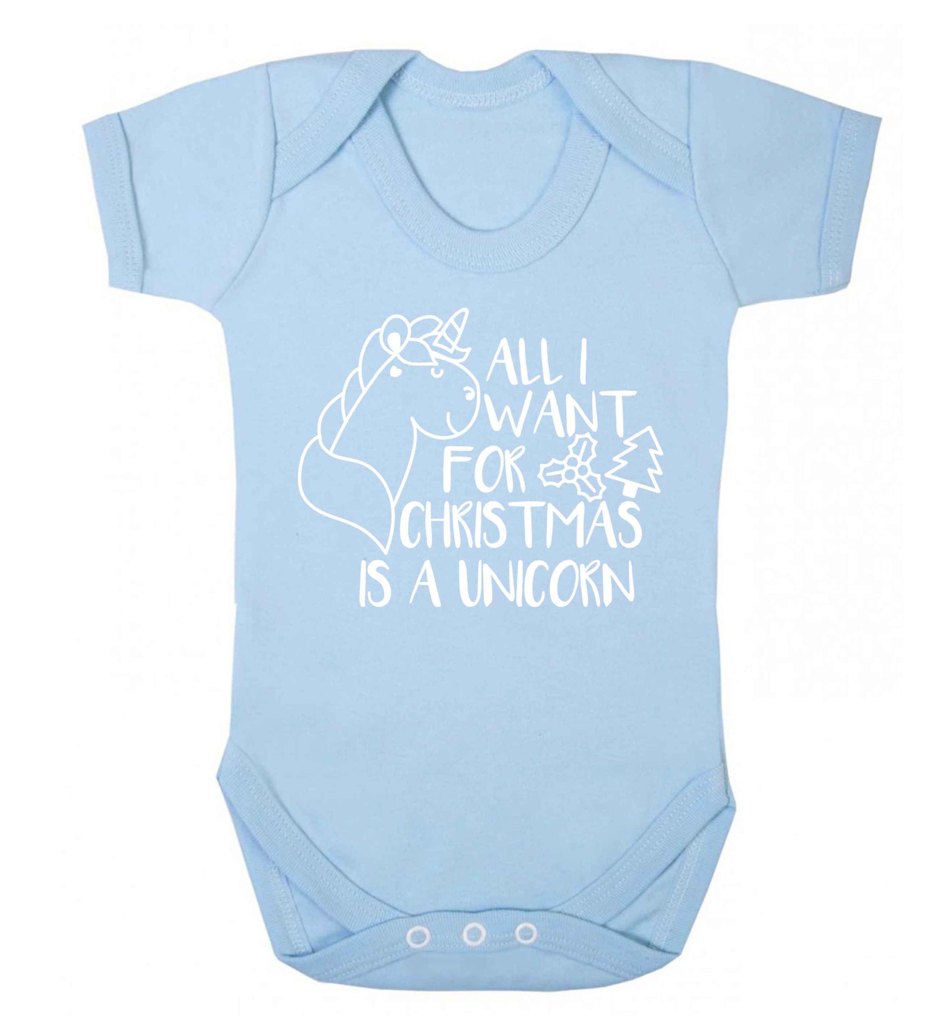 All I want for Christmas is a unicorn Baby Vest pale blue 18-24 months