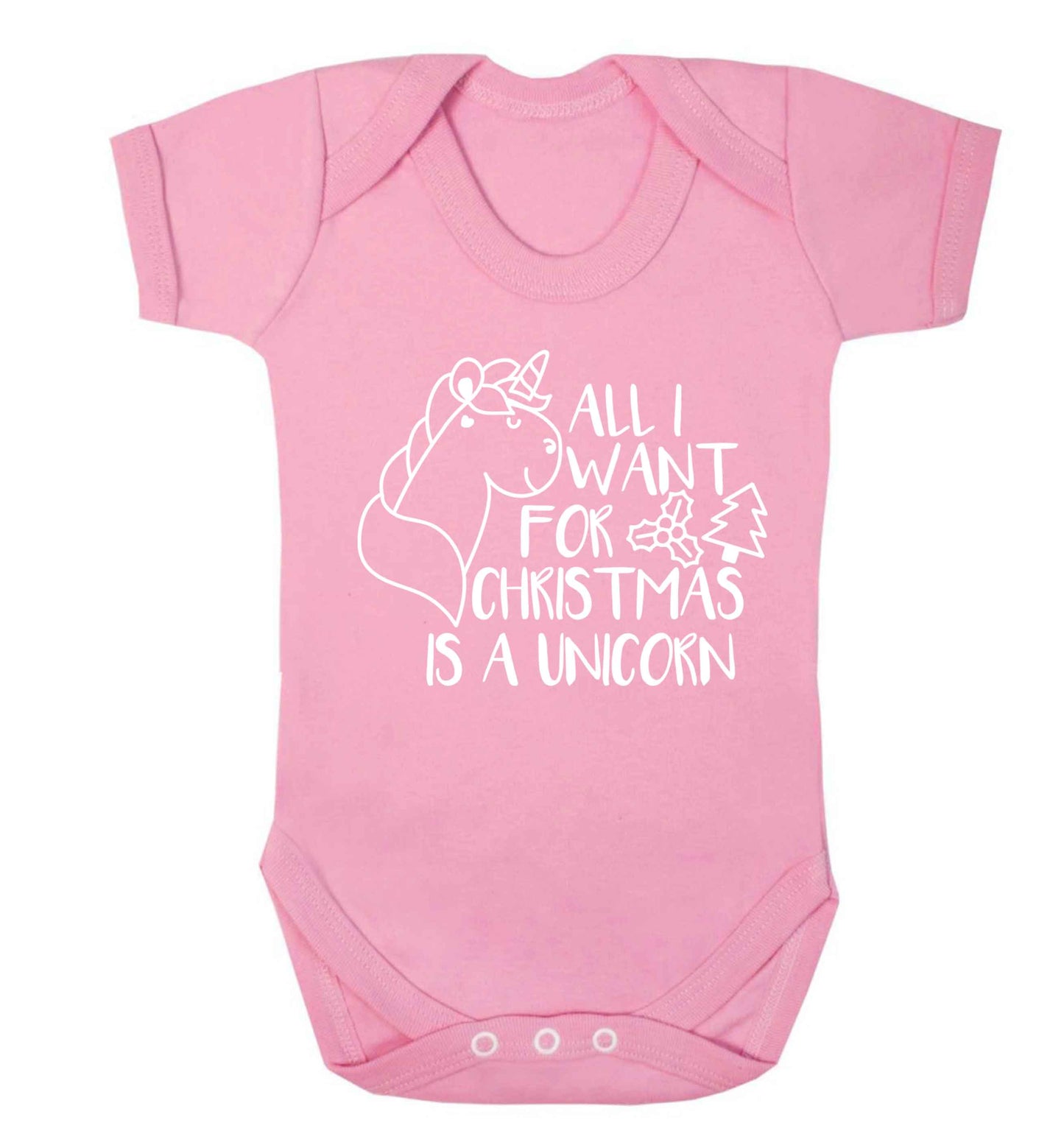 All I want for Christmas is a unicorn Baby Vest pale pink 18-24 months