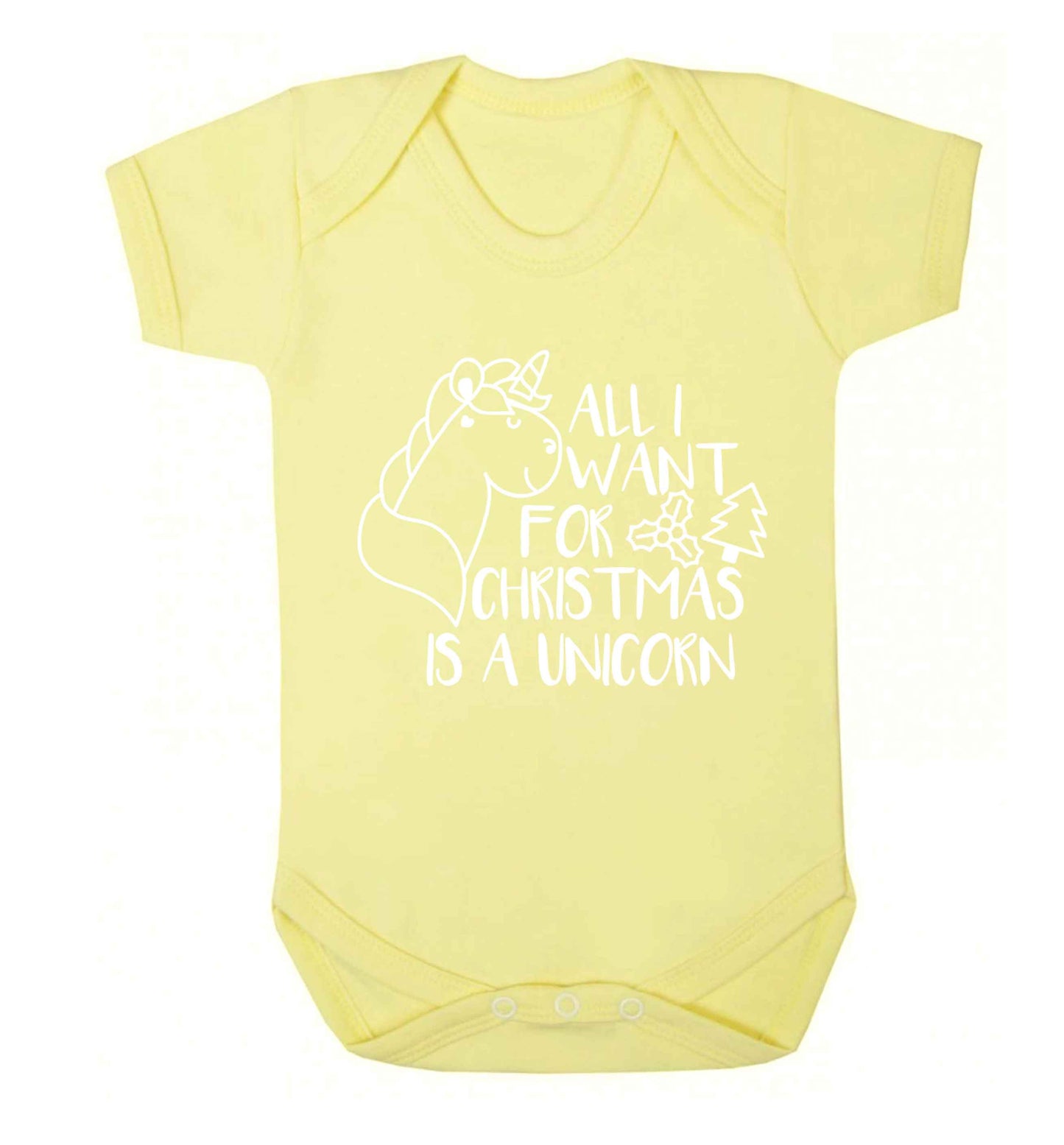 All I want for Christmas is a unicorn Baby Vest pale yellow 18-24 months
