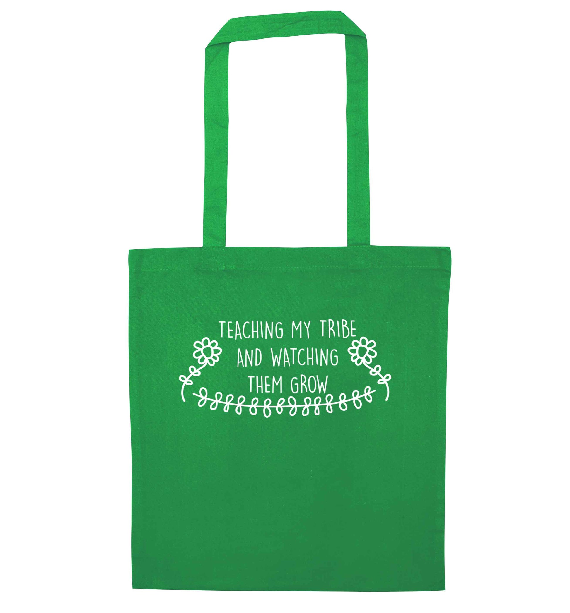 Teaching my tribe and watching them grow green tote bag