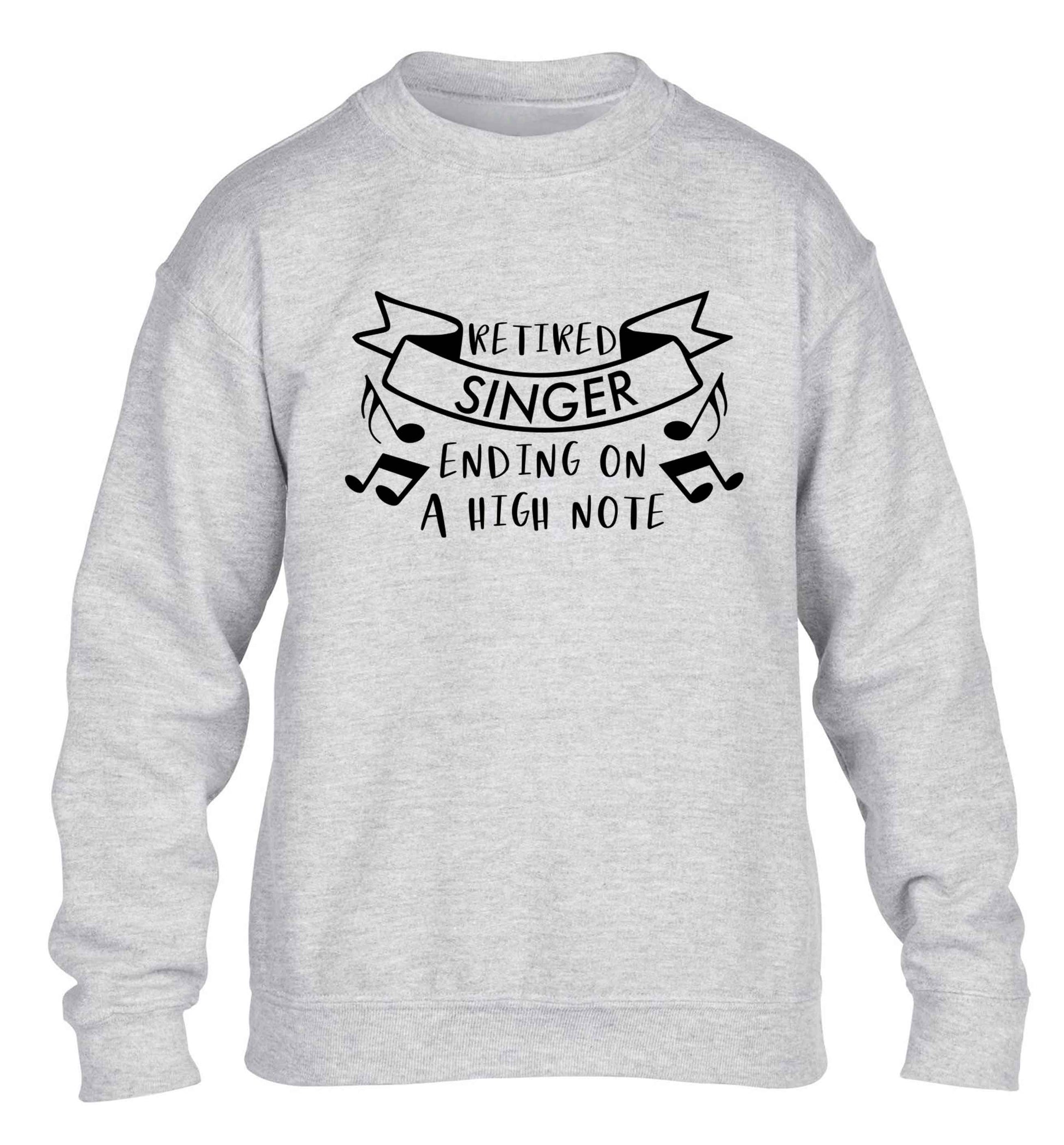 Retired singer ending on a high note children's grey sweater 12-13 Years