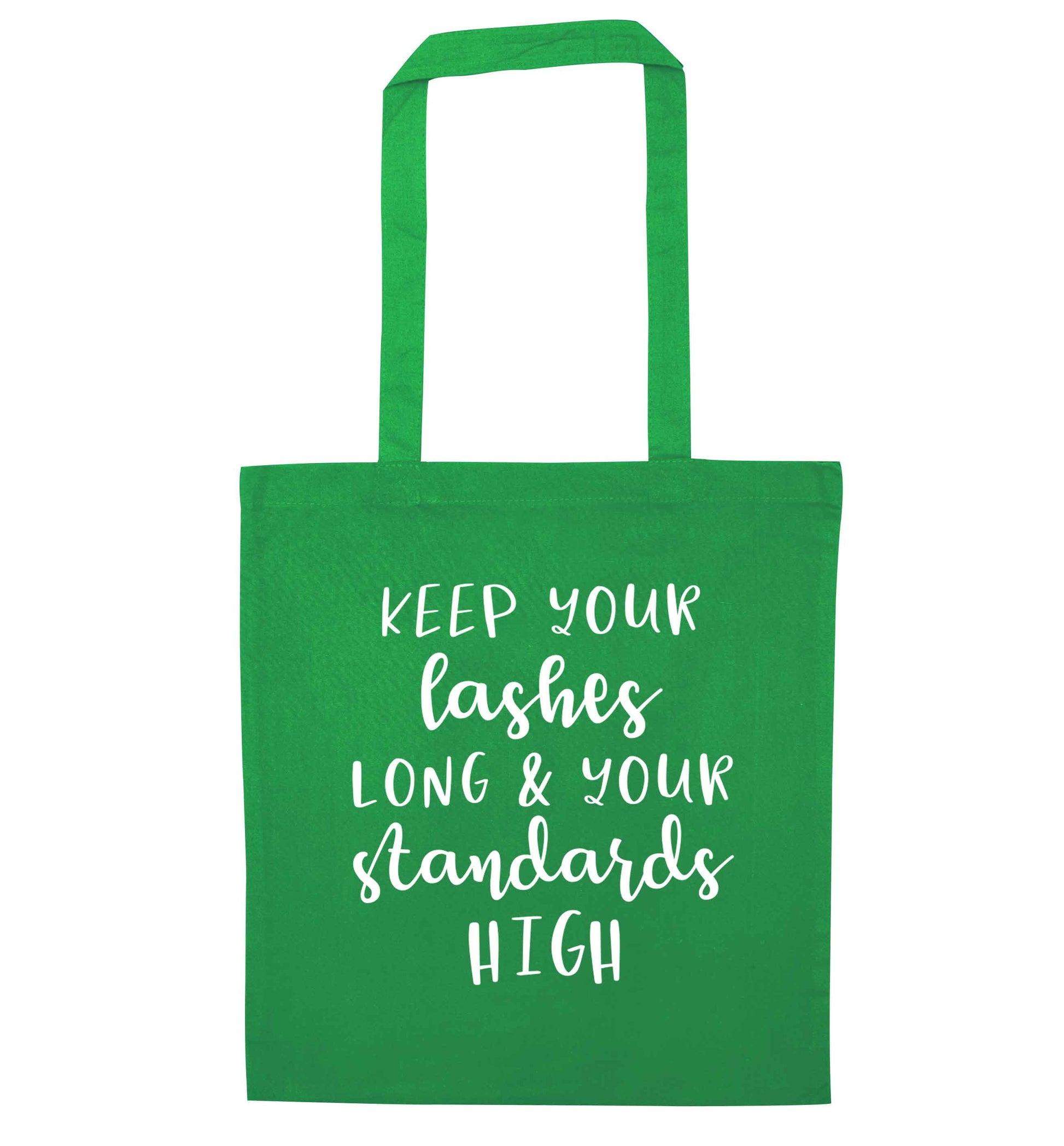 Keep your lashes long and your standards high green tote bag