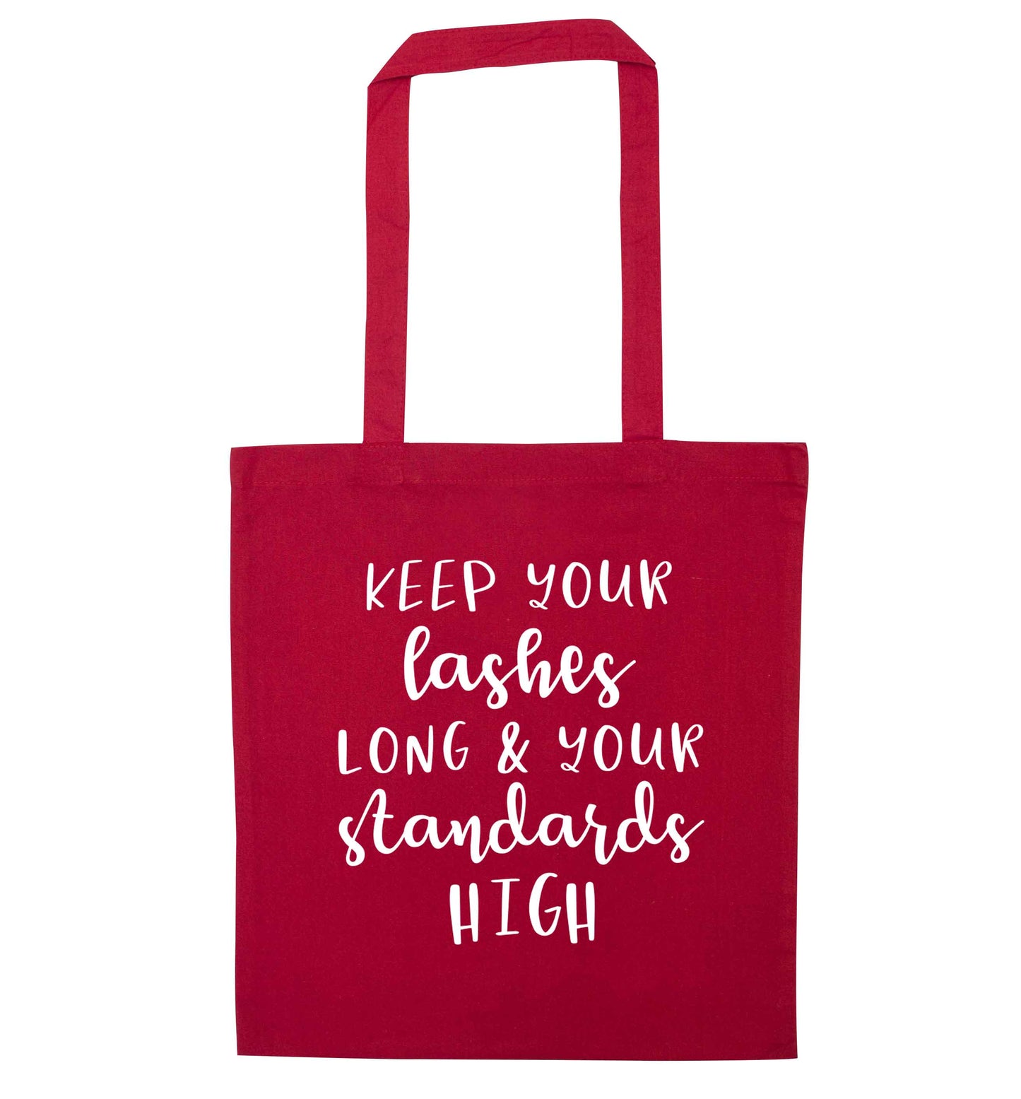 Keep your lashes long and your standards high red tote bag