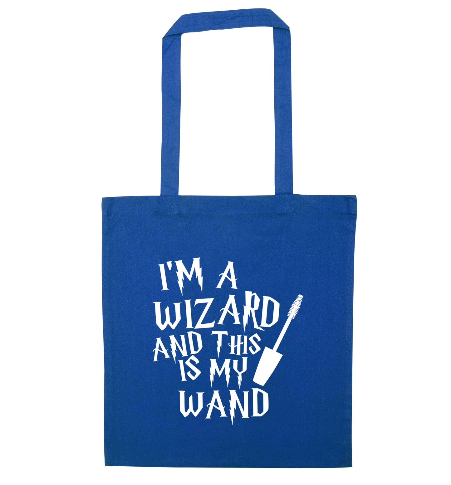 I'm a wizard and this is my wand blue tote bag