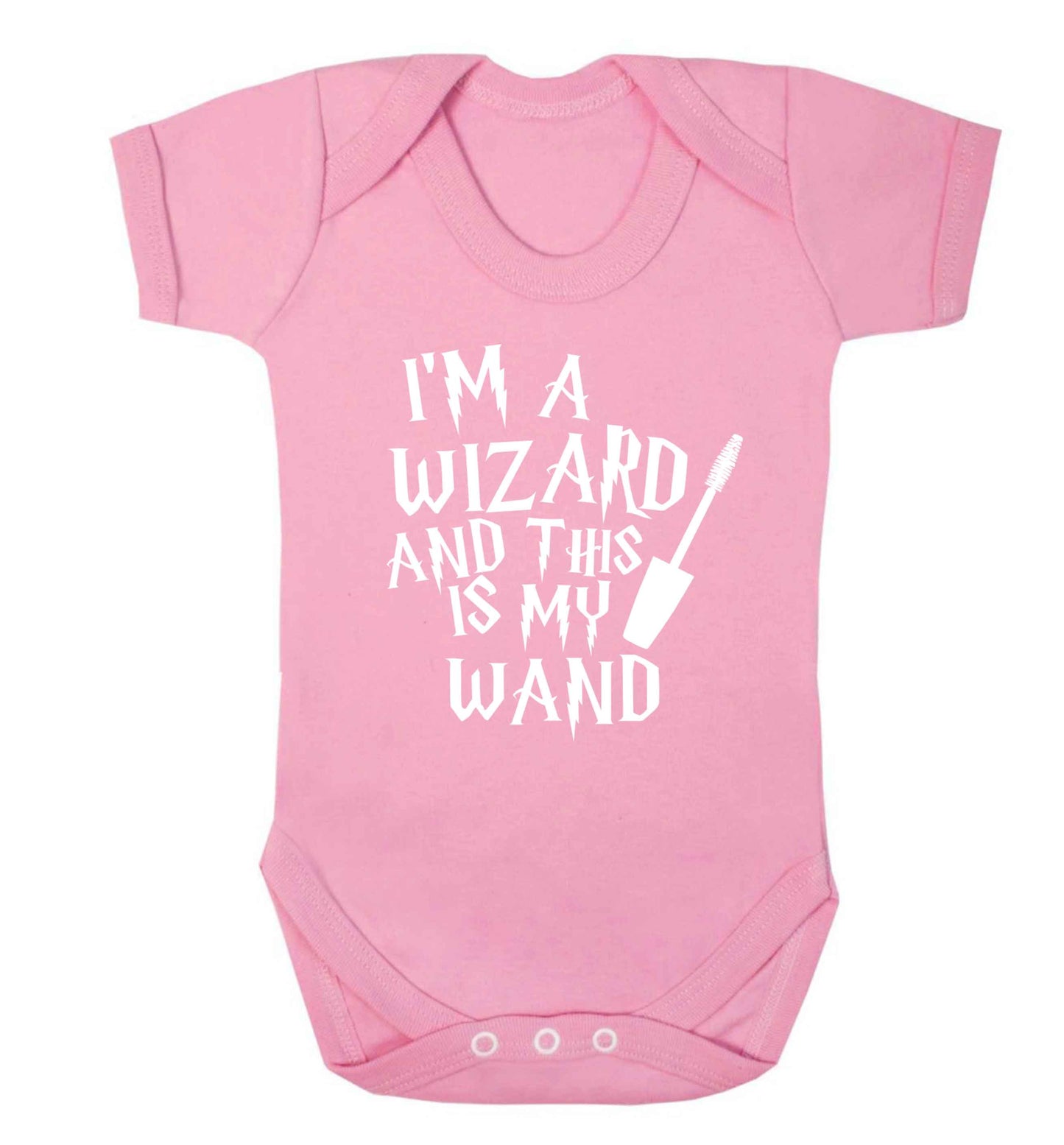 I'm a wizard and this is my wand Baby Vest pale pink 18-24 months