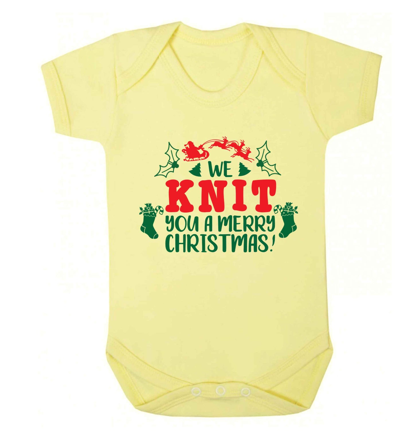 We knit you a merry Christmas Baby Vest pale yellow 18-24 months