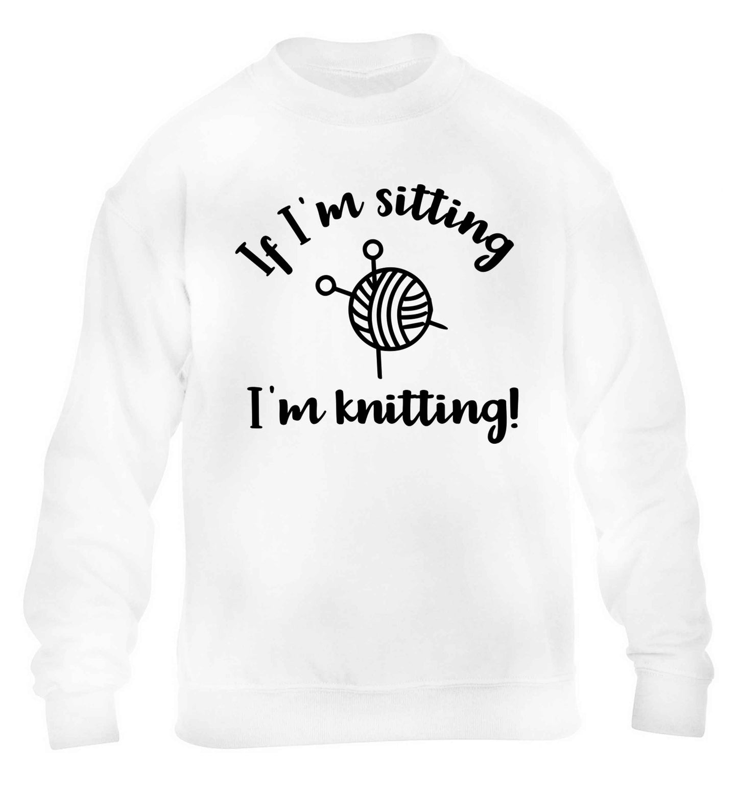 If I'm sitting I'm knitting children's white sweater 12-13 Years