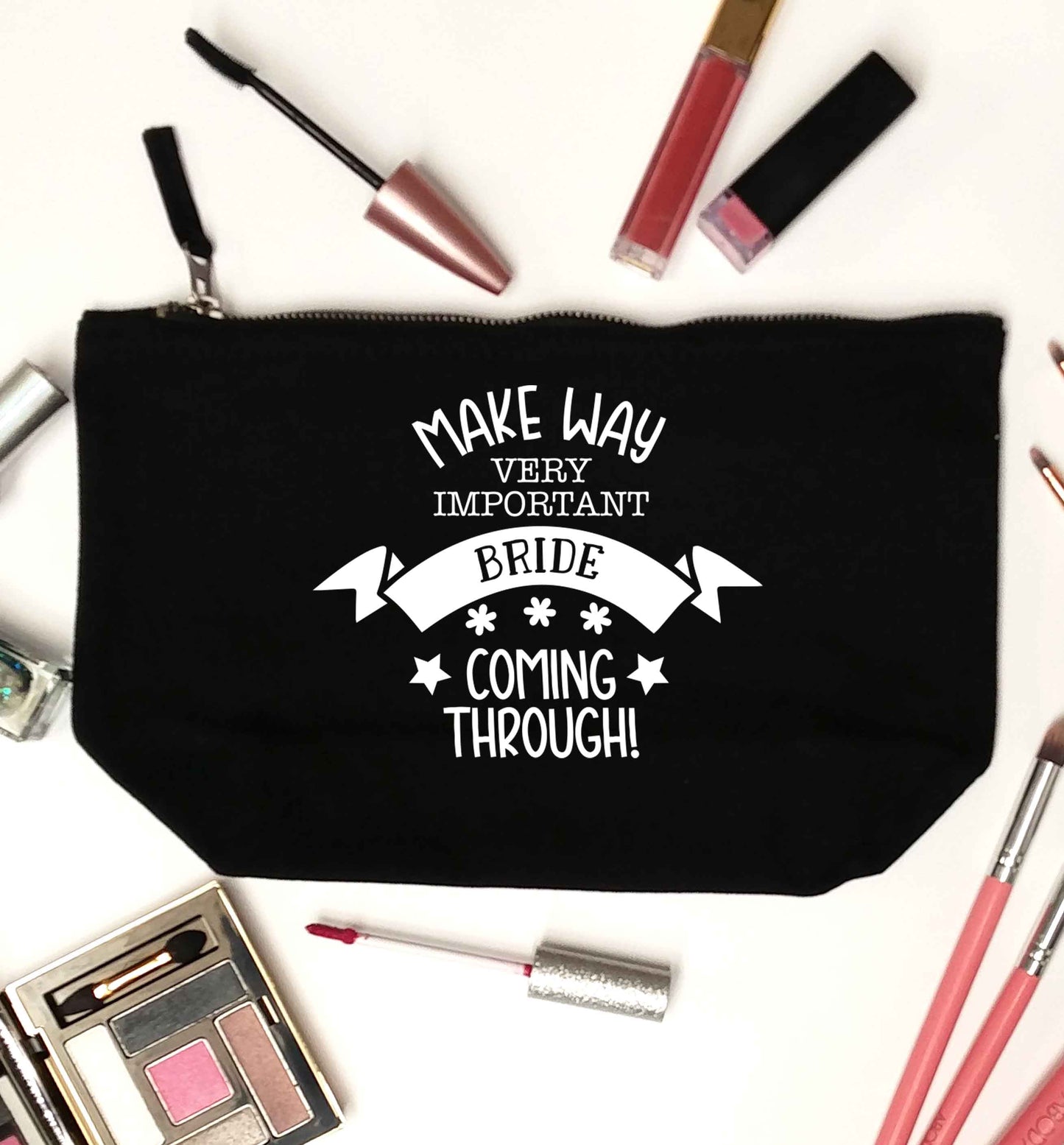 Make way V.I.P very important bride coming through! black makeup bag