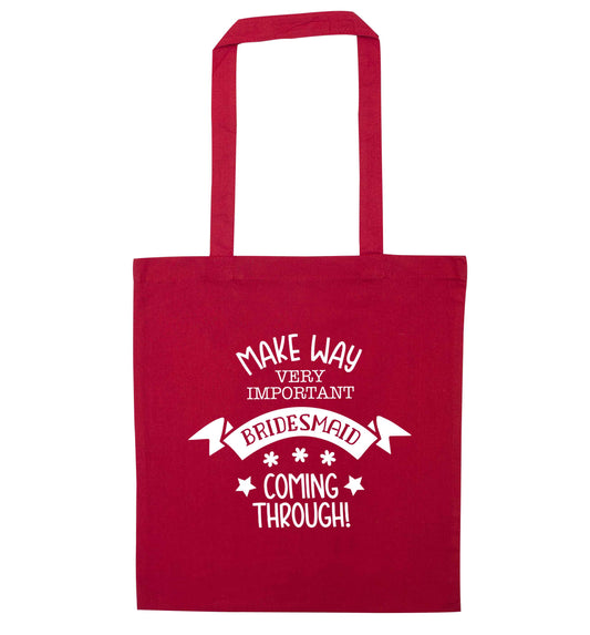 Make way very important bridesmaid coming through red tote bag
