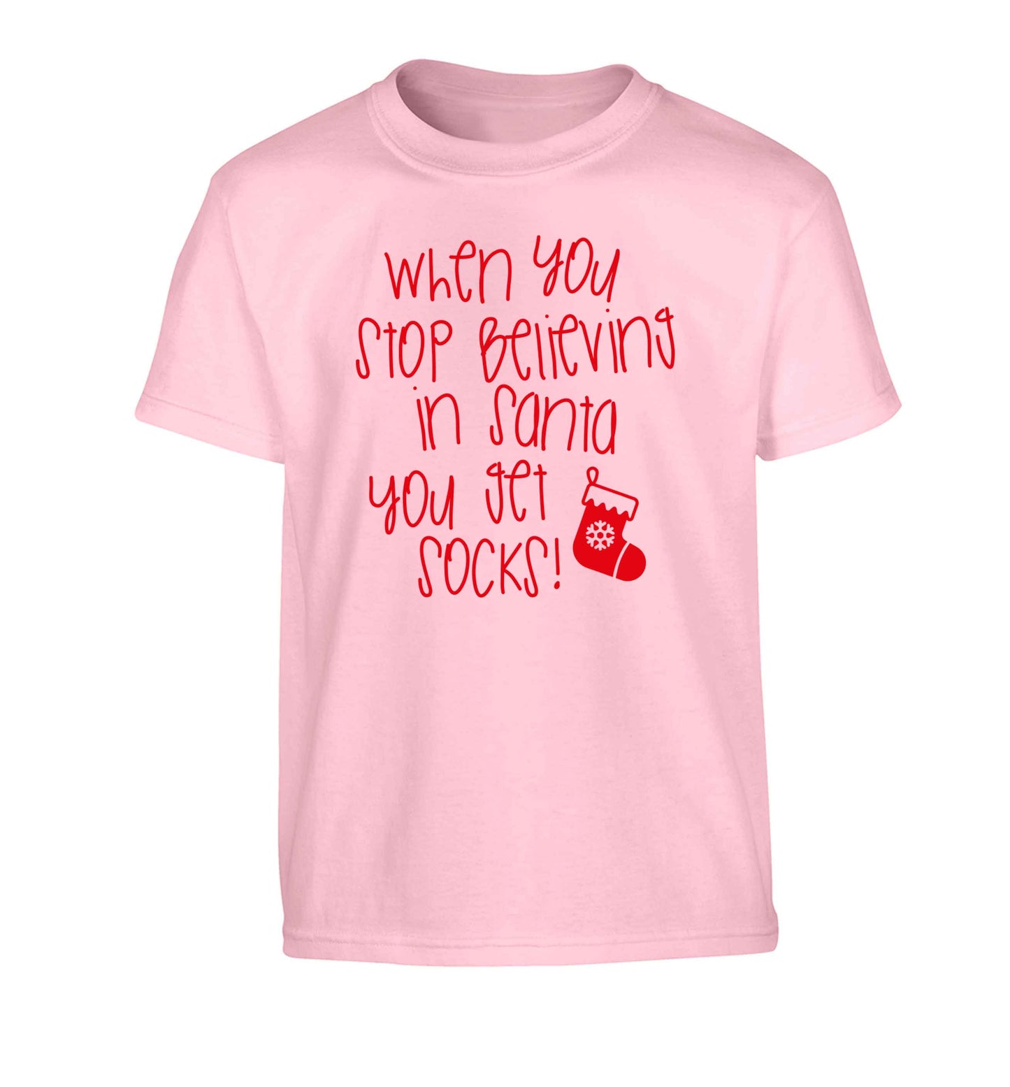 When you stop believing in santa you get socks Children's light pink Tshirt 12-13 Years