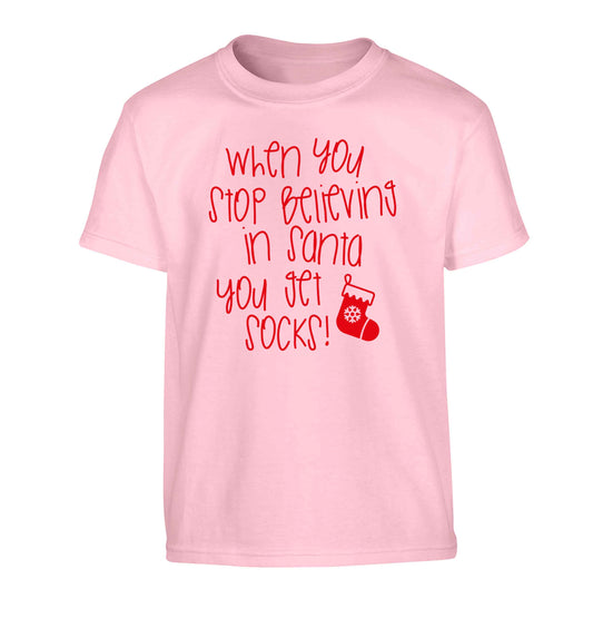 When you stop believing in santa you get socks Children's light pink Tshirt 12-13 Years