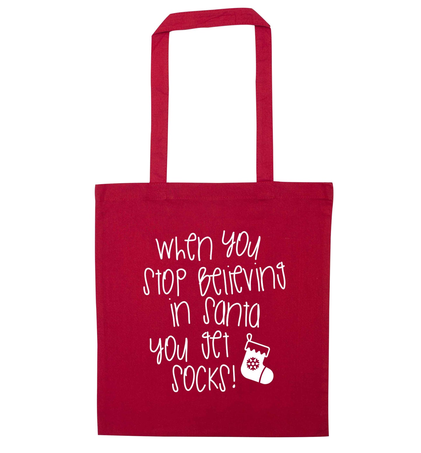 When you stop believing in santa you get socks red tote bag