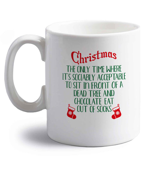 Christmas sit in front of a dead tree and eat chocolate out of socks right handed white ceramic mug 