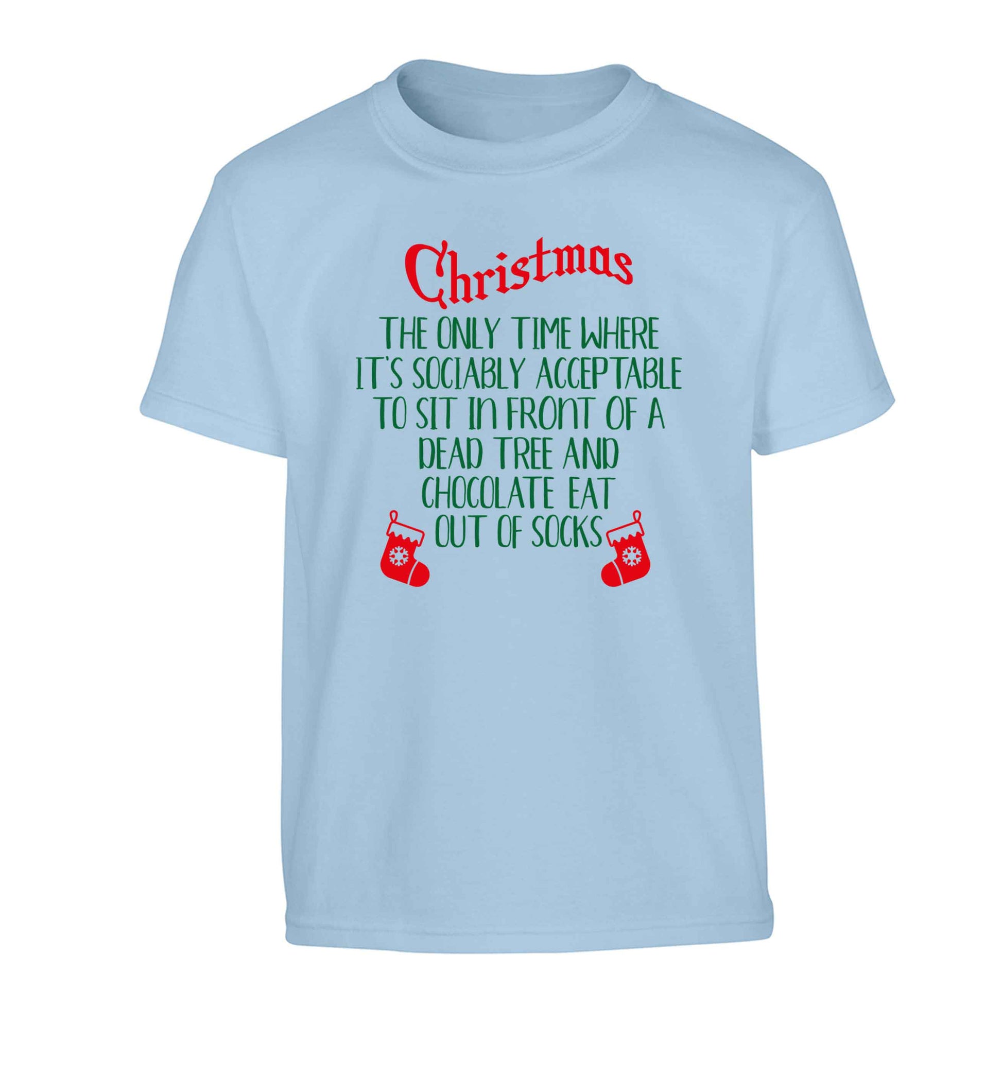 Christmas sit in front of a dead tree and eat chocolate out of socks Children's light blue Tshirt 12-13 Years