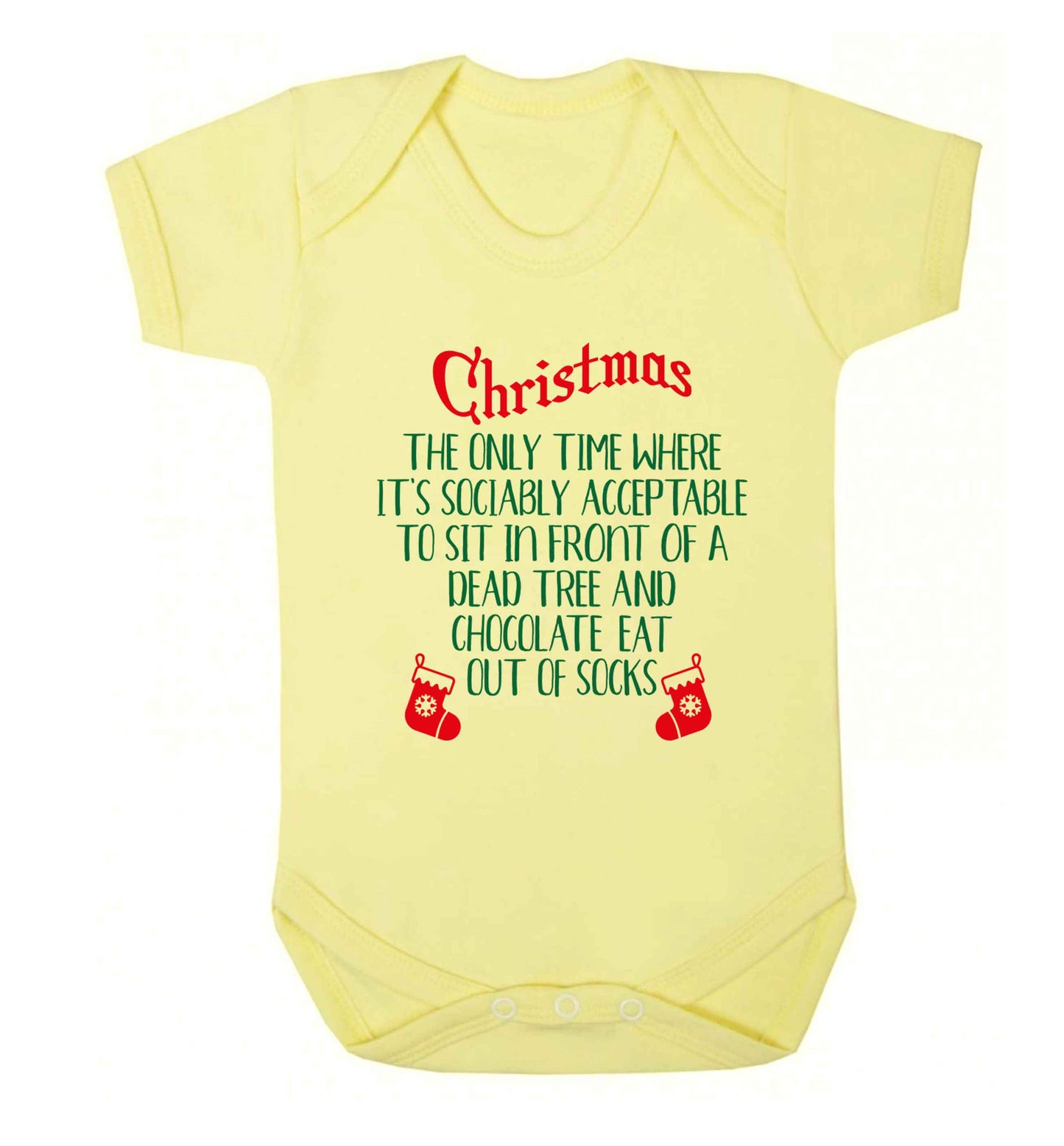 Christmas sit in front of a dead tree and eat chocolate out of socks Baby Vest pale yellow 18-24 months