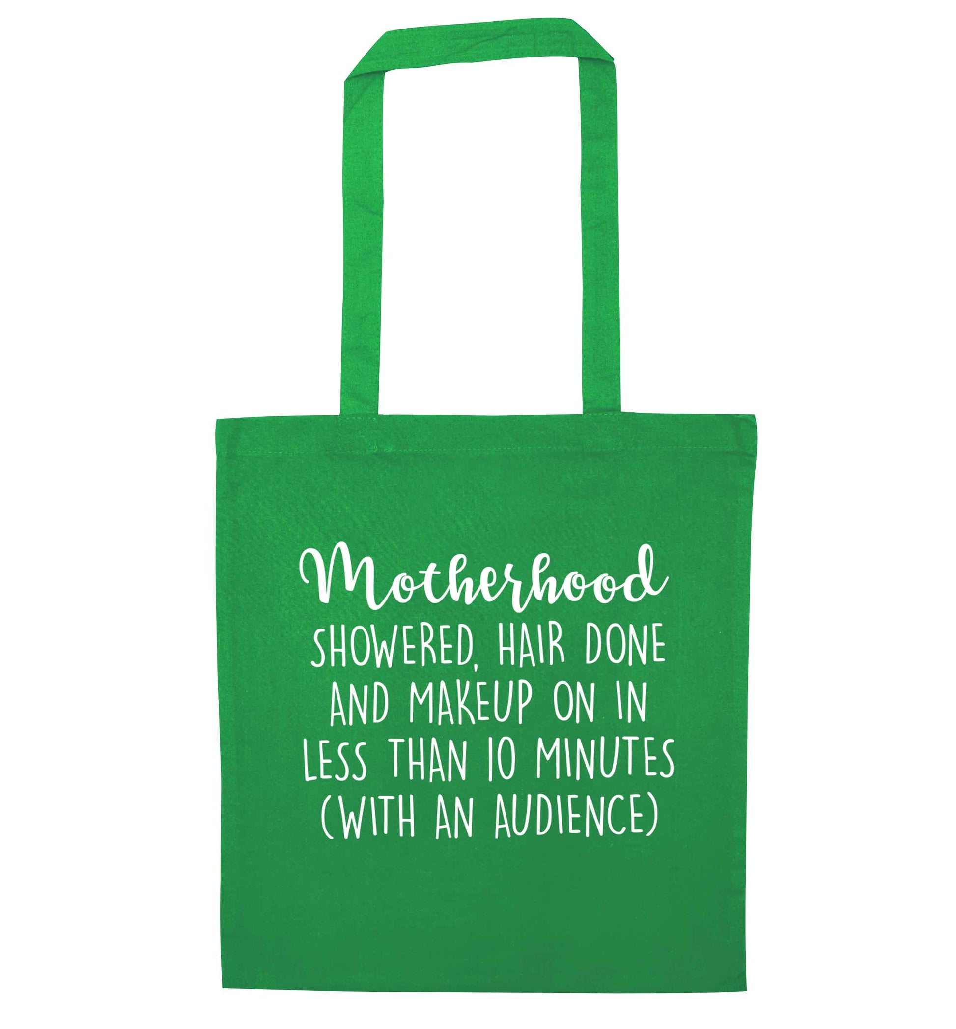 Motherhood, showered, hair done and makeup on green tote bag